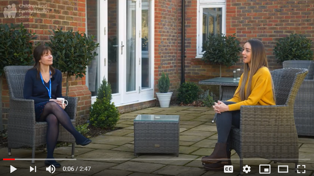 YouTube video image of two women sat talking