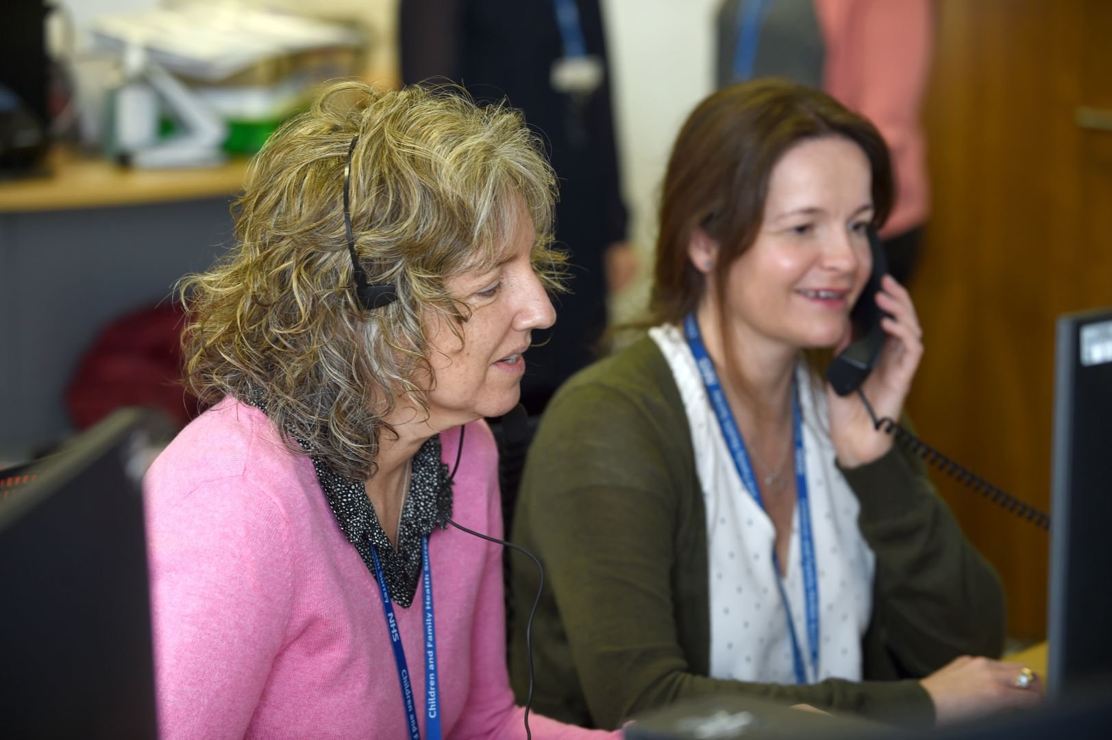 Surrey-wide 0-19 Advice Line two women with headsets